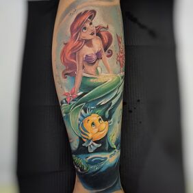 Tattoo Little Mermaid, Disney on the calf motif: colorful style: graphic / illustrative