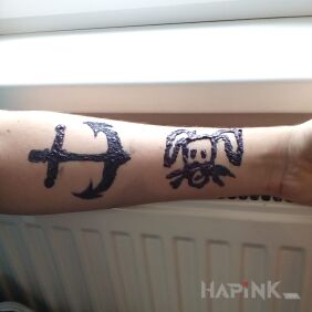 Tattoo Robert bum bum on the upper arm motif: other