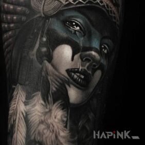 Tattoo Indian woman on the upper arm motif: characters