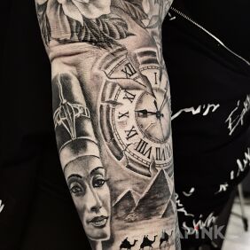 Tattoo Nefertiti on the forearm motif: black and gray style: realistic
