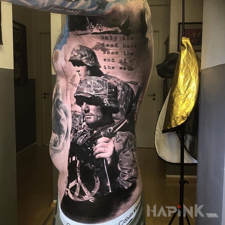 Tattoo Amerykańscy żołnierze in black and gray motif and realistic style on the ribs