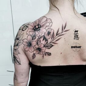 Tattoo Floral composition biceps blade on the shoulder motif: black and gray style: blackwork / blackout