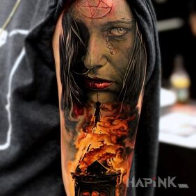 Tattoo Devil's tattoo on the upper arm motif: characters style: realistic