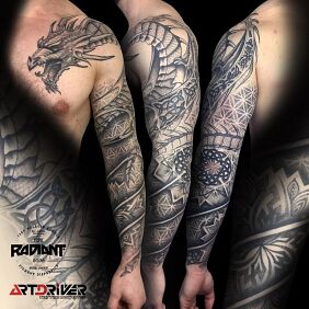 Tattoo Dragon emerging from a mandala on the collarbone motif: fantasy style: geometric
