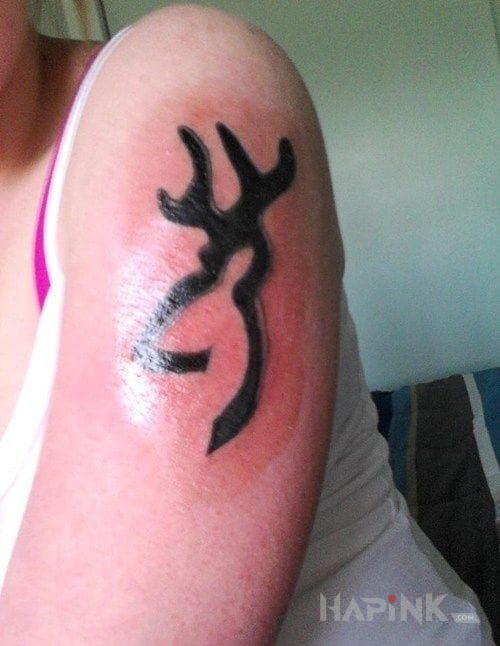 Tattoo Zagadka in other motif on the upper arm
