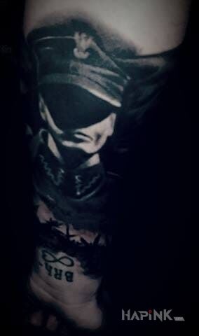 Tattoo Patriotyczny tatuaż in patriotic motif and realistic style on the forearm