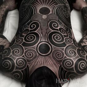 Tattoo Black spirals on the chest motif: other style: blackwork / blackout