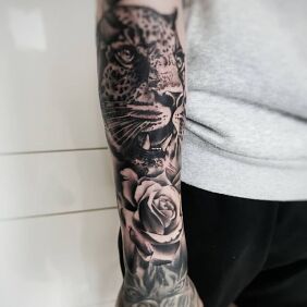Tattoo Cheetah On the arm motif: animals style: realistic