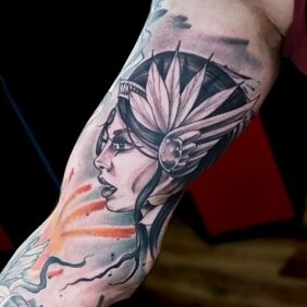 Tattoo Indian woman On the arm motif: faces style: realistic