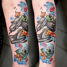 Tattoo Cosmic sewing machine On the arm motif: characters style: cartoon / comic book