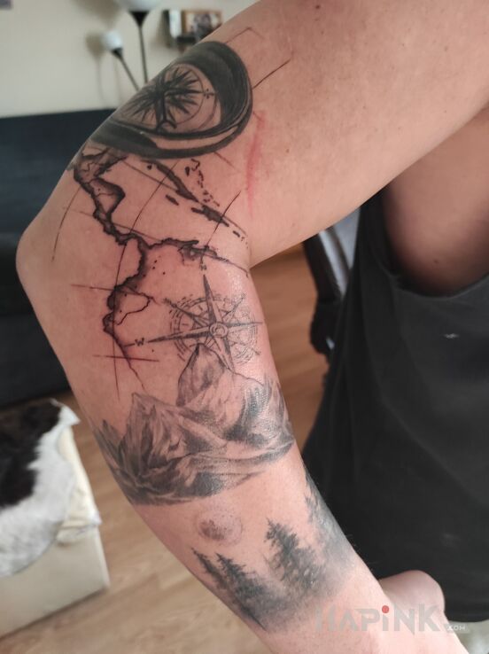 Tattoo Geografia in objects motif and graphic / illustrative style On the arm