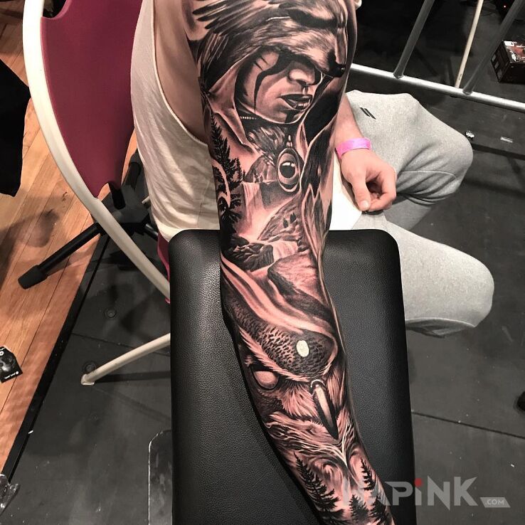 Tattoo Szamanka w futrze z wilka in sleeves motif and realistic style On the arm