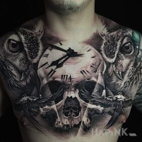 Tattoo Bone clock on the chest motif: skulls style: realistic