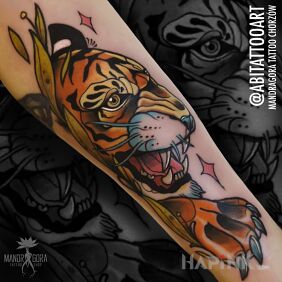 Tattoo Tiger On the arm motif: colorful style: neo-traditional