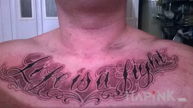 Tattoo Life is a fight in lettering motif on the chest