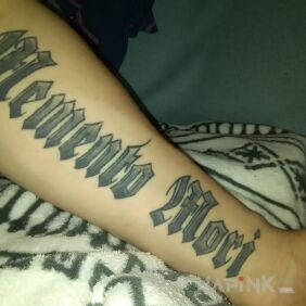 Tattoo Memento mori on the forearm motif: lettering
