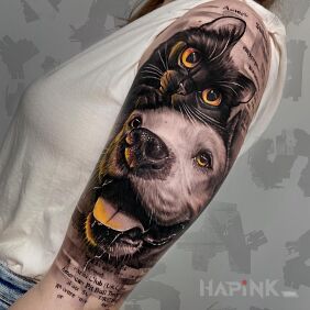 Tattoo Cat and dog On the arm motif: colorful style: realistic
