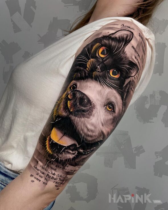 Tattoo Kot i pies in 3D motif and realistic style on the upper arm