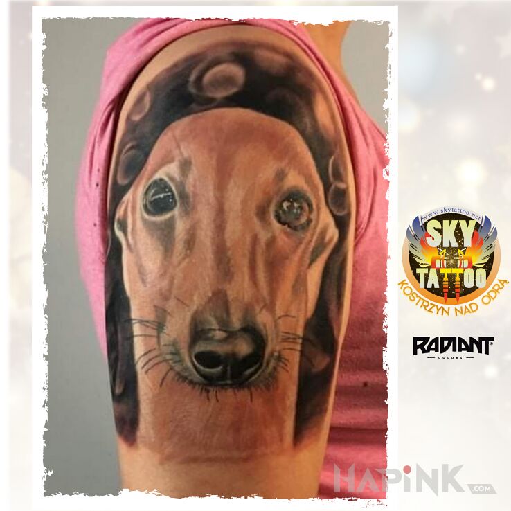 Tattoo Cleo i jej Pani in animals motif and realistic style on the upper arm