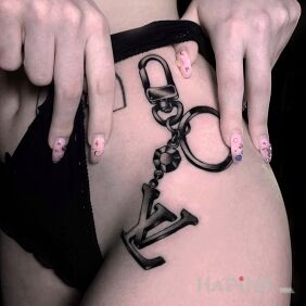 Tattoo Handcuffs on the hip motif: objects style: graphic / illustrative