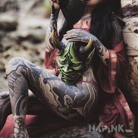 Tattoo Geisha tempts with a tattooed leg on the foot motif: legsleeves style: japanese / irezumi