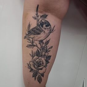 Tattoo Sparrow on the forearm motif: black and gray style: graphic / illustrative