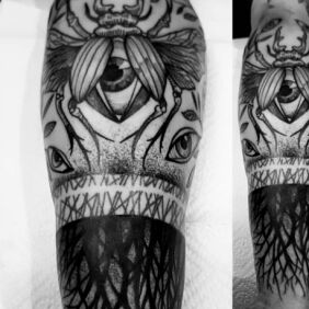 Tattoo Beetle band on the forearm motif: black and gray style: blackwork / blackout