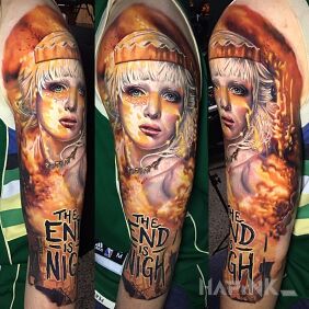Tattoo The end is nigh on the upper arm motif: lettering style: realistic