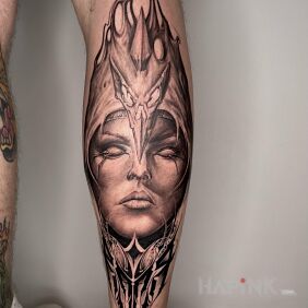 Tattoo Demonic face on the leg motif: faces style: realistic