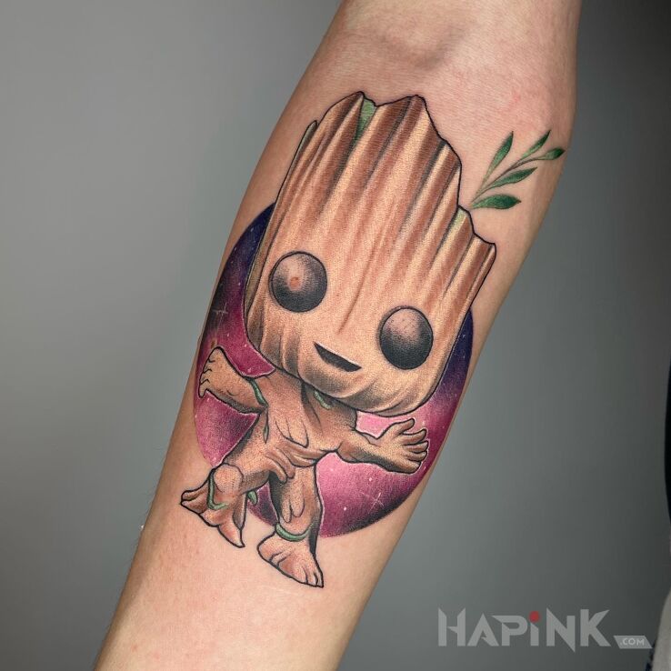 Tattoo Grot in characters motif and newschool style on the forearm