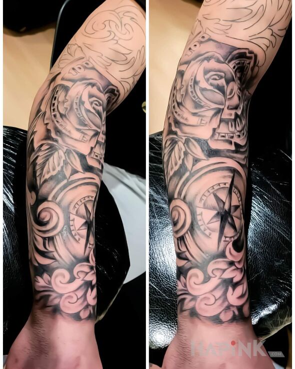 Tattoo Nowy 😊 in objects motif and realistic style on the forearm