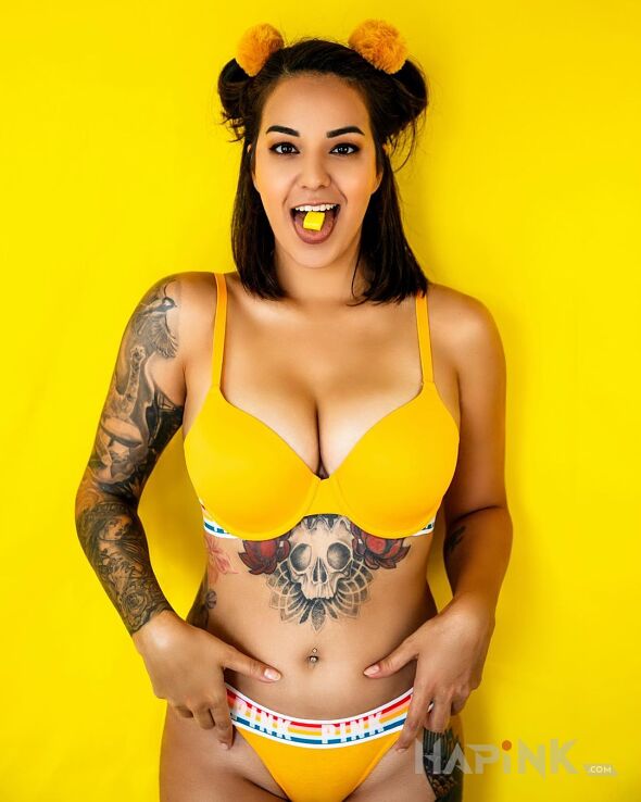 Tattoo Zolciutka in skulls motif and graphic / illustrative style on the stomach