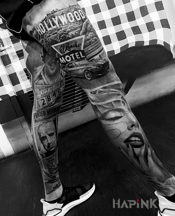 Tattoo Hollywood in black and gray motif and realistic style on the thigh
