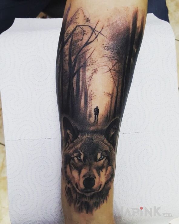 Tattoo Wilk i las in animals motif and realistic style on the forearm