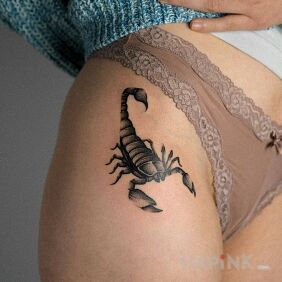 Tattoo Scorpio on the hip motif: black and gray style: realistic