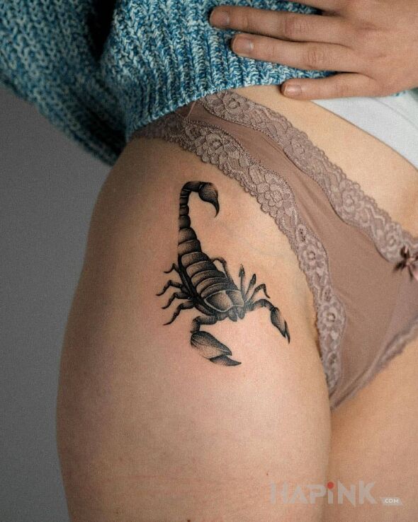 Tattoo Scorpio in animals motif and realistic style on the hip