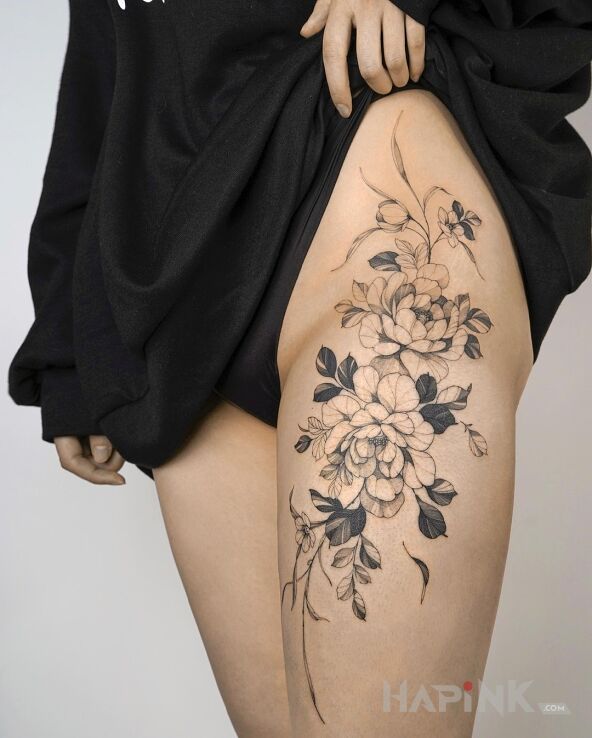 Tattoo Kwiatuszki, nie jeden a dwa in black and gray motif and graphic / illustrative style on the thigh