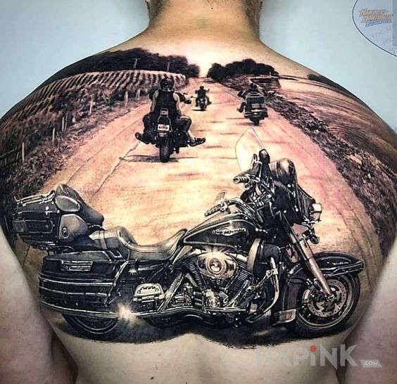 Tattoo Chooper in black and gray motif and realistic style on the shoulder blades
