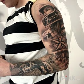 Tattoo Something for motorcycle fans On the arm motif: black and gray style: realistic