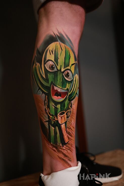 Tattoo Gangsterski Kaktus in characters motif and newschool style on the calf