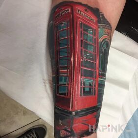 Tattoo Red phone booth on the forearm motif: 3D style: realistic