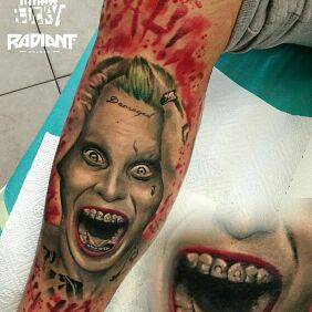 Tattoo Joker Jared Leto on the leg motif: faces style: Watercolor