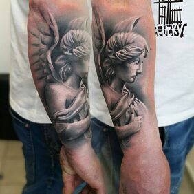 Tattoo Angelica on the forearm motif: black and gray style: realistic
