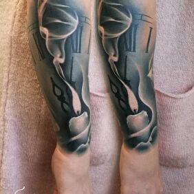 Tattoo Candle on the forearm motif: black and gray style: realistic