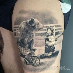 Tattoo Bear on a Bicycle on the leg motif: animals style: realistic