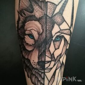 Tattoo Geometric Wolf on the forearm motif: animals style: dotwork