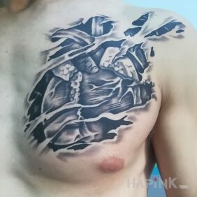 Tattoo Heart on the chest motif: anatomical style: realistic