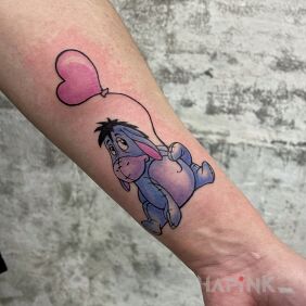 Tattoo Dopey on the forearm motif: characters style: graphic / illustrative