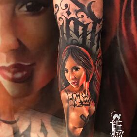 Tattoo Sexy baby on the forearm motif: colorful style: realistic