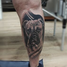 Tattoo Pupil on the leg motif: black and gray style: realistic